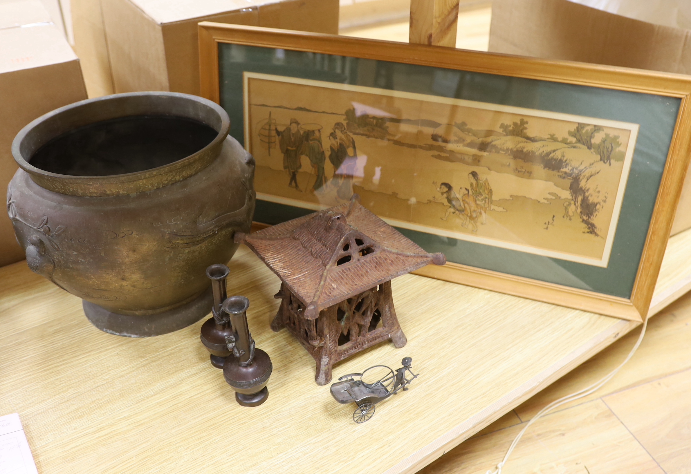 A Japanese bronze jardiniere, a similar pair of small bottle vases, a Japanese cast-iron lantern, a Japanese print, and a Chinese silver model of a rickshaw